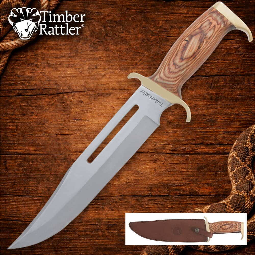 Bowie knife with wood handle on wooden background image number 0