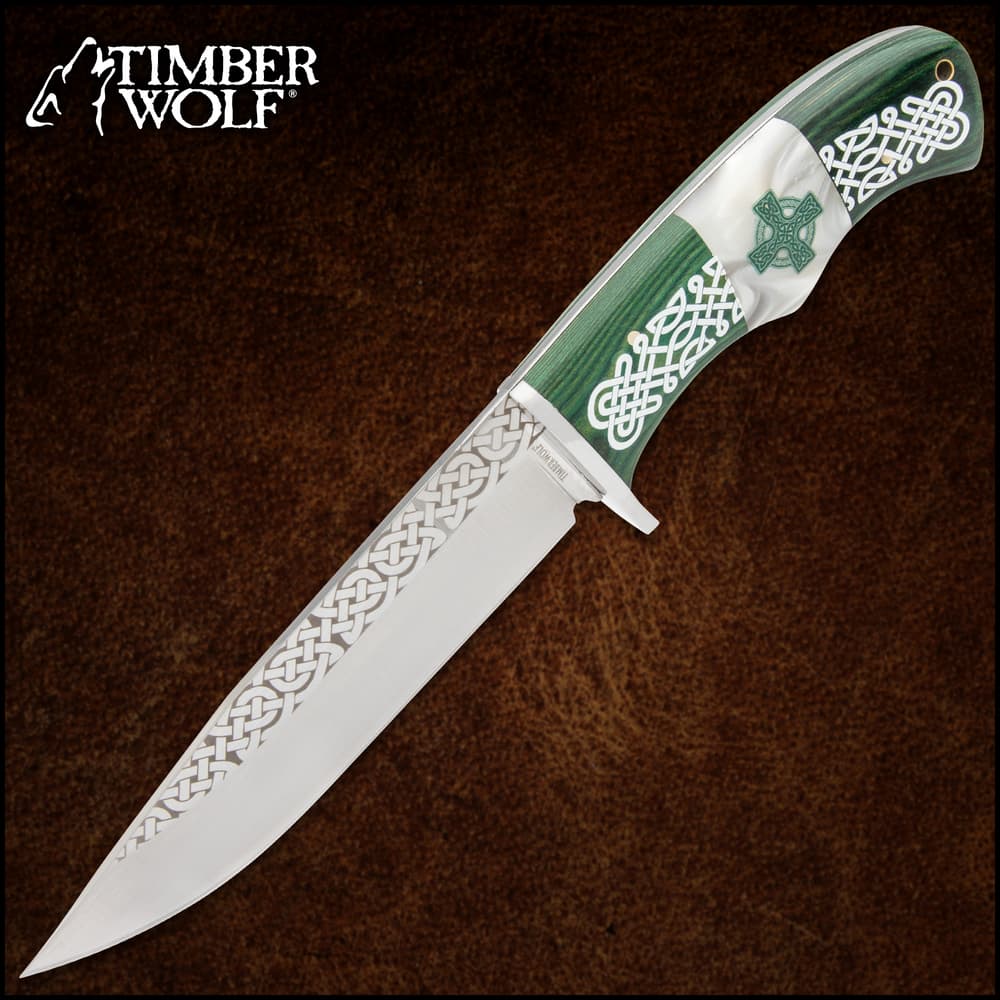 A handsome fixed blade knife from Timber Wolf that features an elegantly etched Celtic knotwork design on the handle image number 0