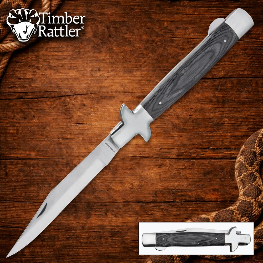 Timber Rattler knife with wooden handle on wood background image number 0