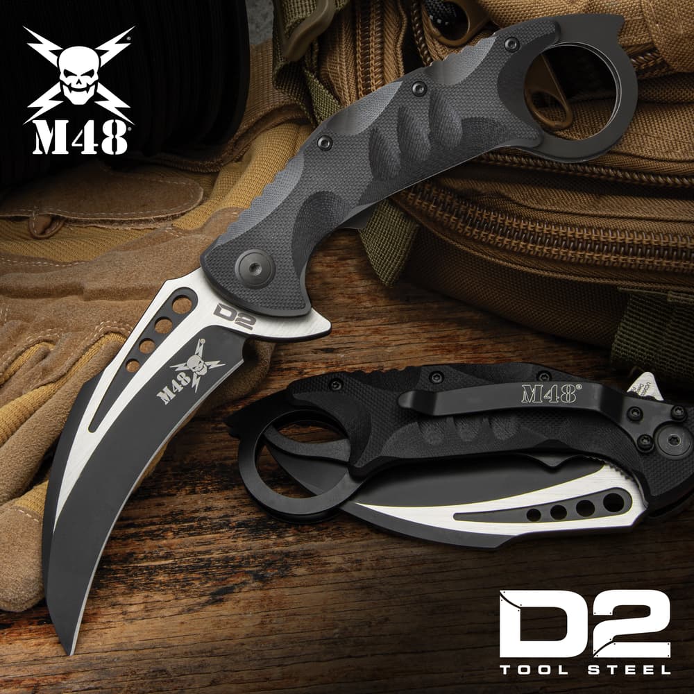 Full image of the M48 Steel Titan Folder Karambit open and closed. image number 0