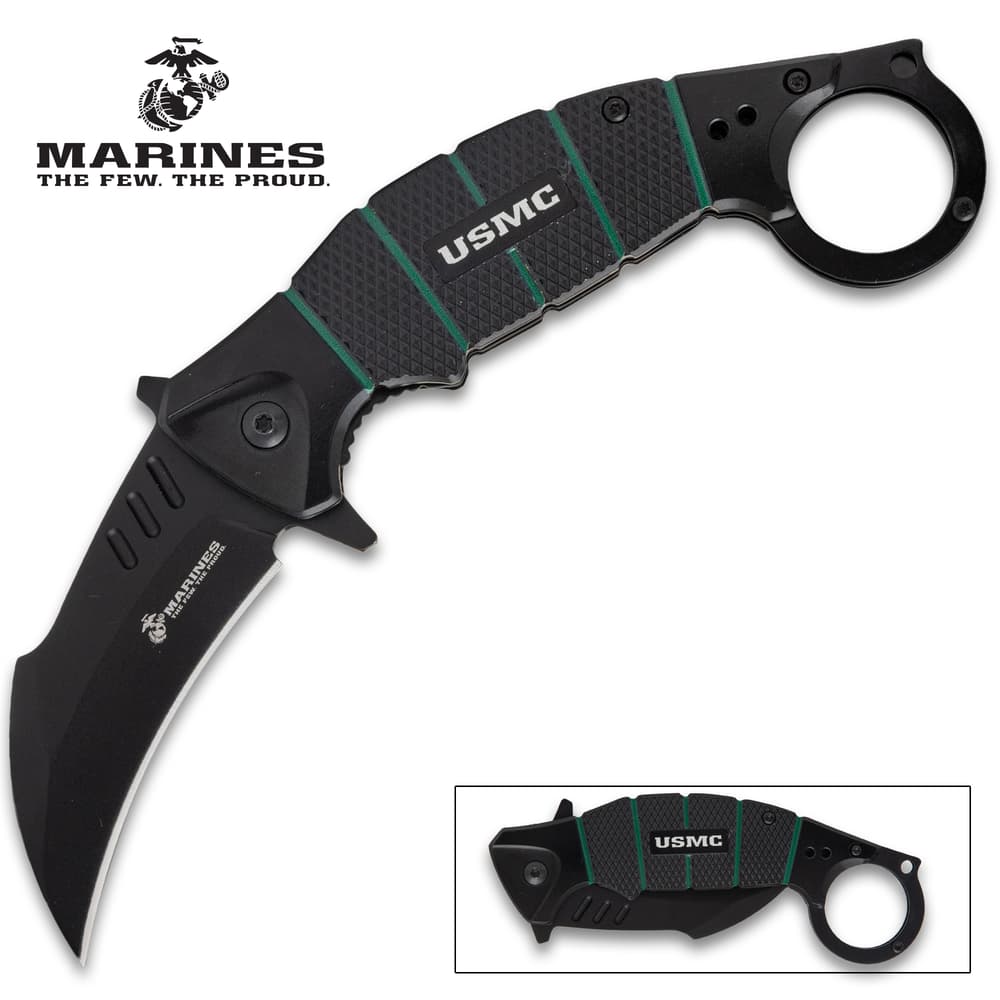Black USMC karambit knife with curved blade and finger ring image number 0
