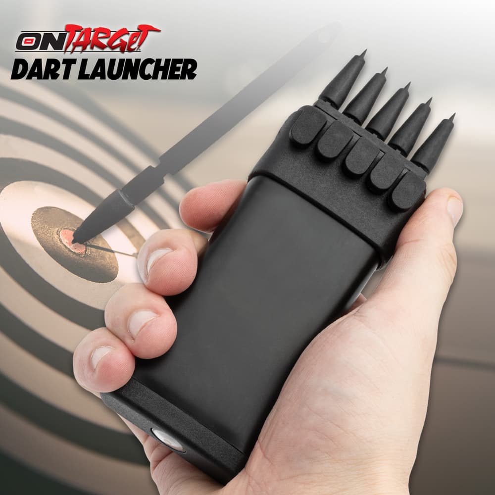 Full image of the On Target Dart Launcher held in hand. image number 0