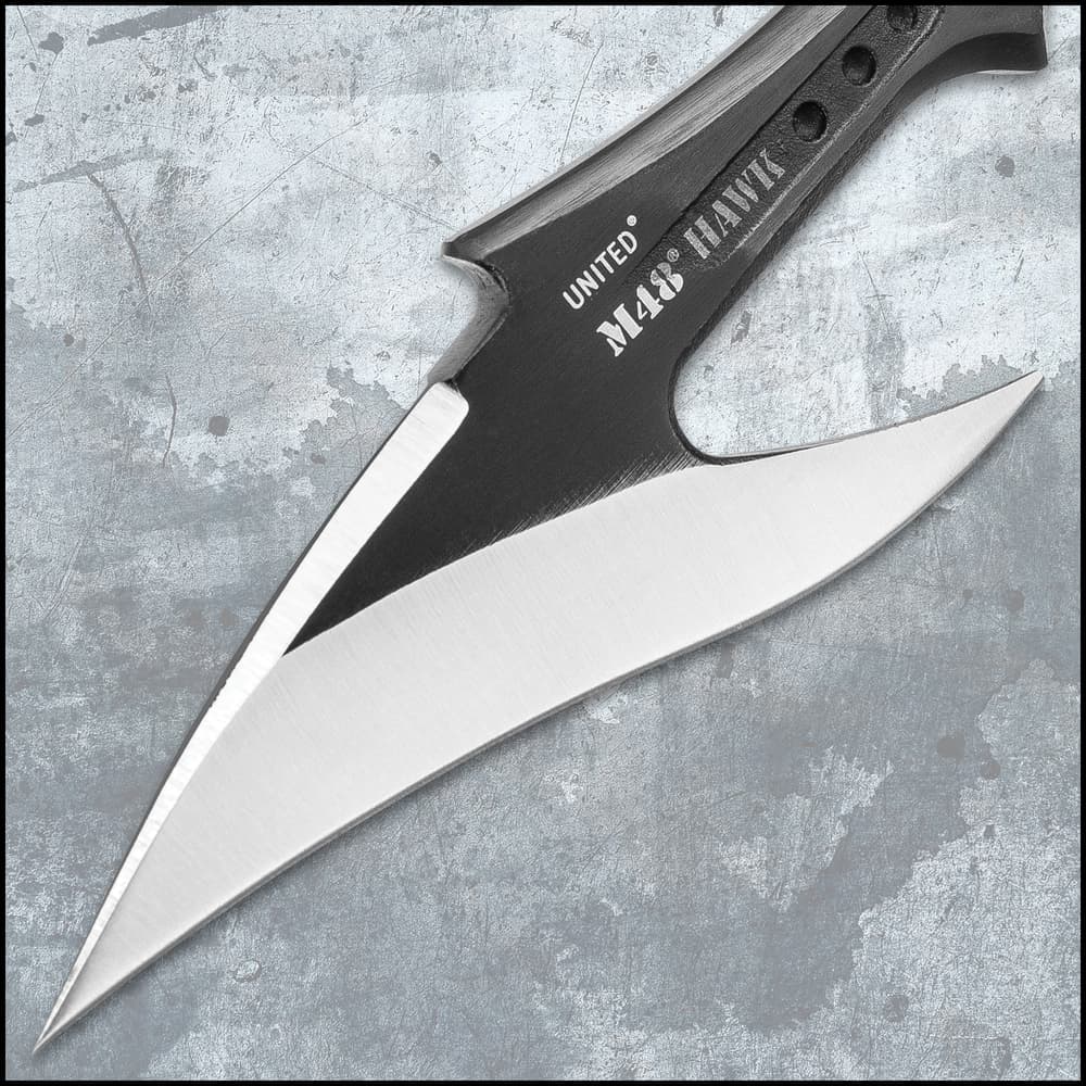 The harpoon is housed in a rubberized sheath. image number 1