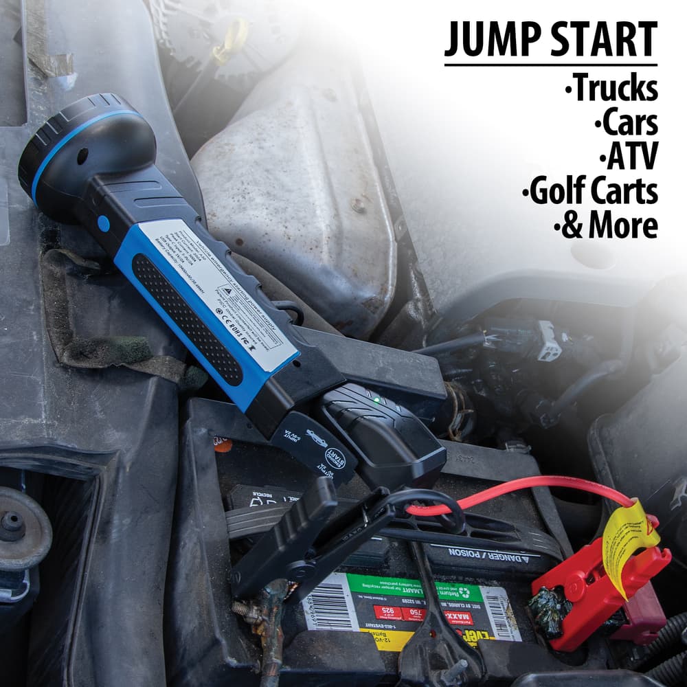 The flashlight jumper shown charging a car battery image number 1