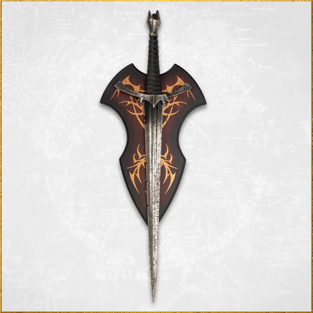 Sword mounted on a decorative shield with patterns