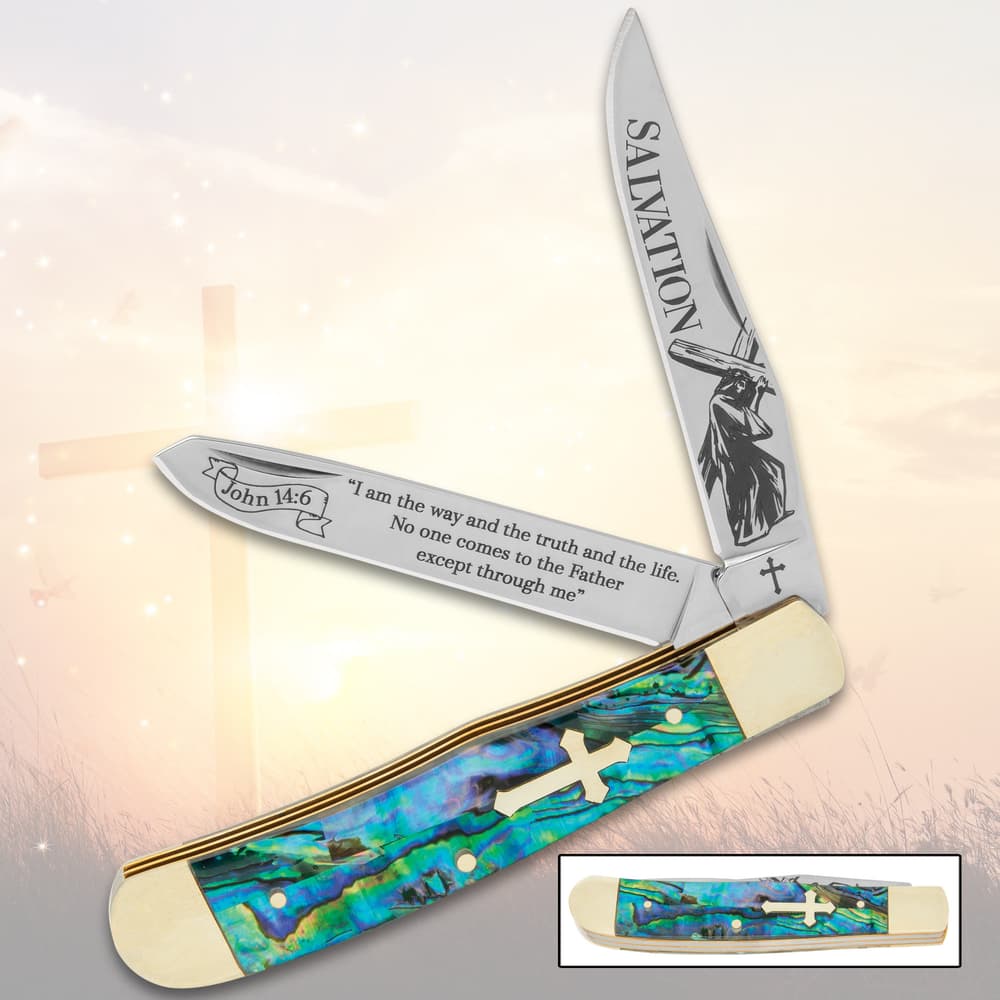 Pocket knife with abalone handle, cross inset, and etched blades image number 0