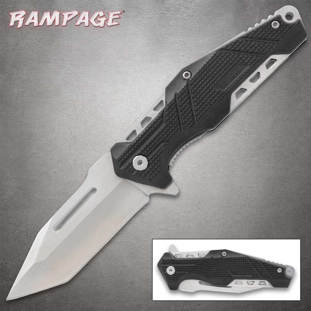 Black and silver folding knife with textured handle image number 0