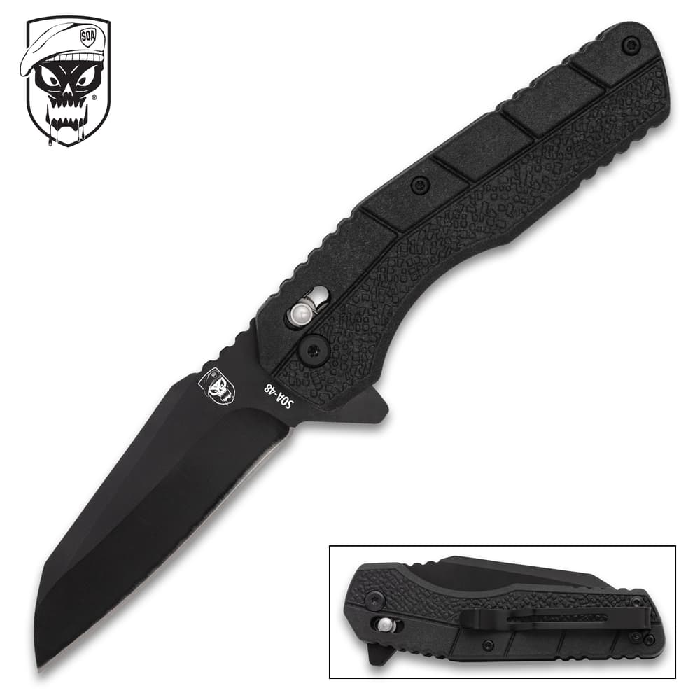 Black folding knife with textured handle and logo image number 0