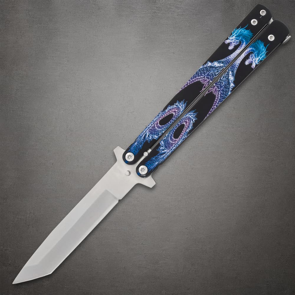 Butterfly knife with blue dragon design on handles image number 0