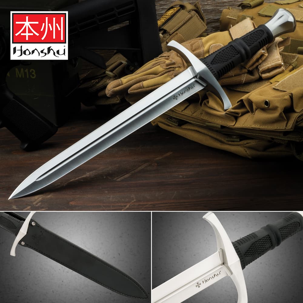 Dagger with a satin finish, hand guard, black TPR handle, and cast steel pommel, resting upon a military style glove and backpack with a logo displaying Japanese symbols and "Honshu" in the top left c image number 0