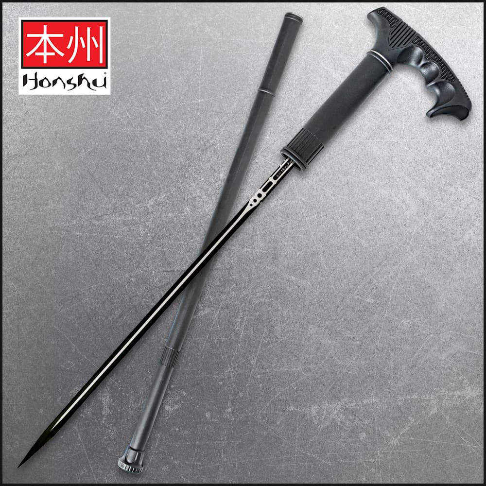 Honshu Sword Cane shown with blade outside of the cane housing on a wooden surface next to rocks. image number 0