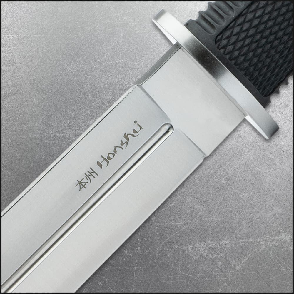 The 13 1/4” knife has a 7 5/8” full-tang 440A stainless steel blade with deep blood groove. image number 1