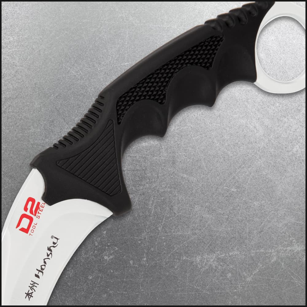 The karambit is 8 3/4" in overall length and it can be carried discreetly in a tough ABS, adjustable shoulder harness sheath image number 1