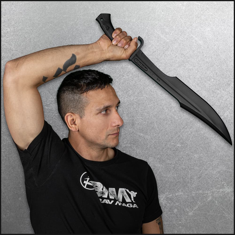 Full image of the Spartan Training Sword included in the Warrior's Journey Bundle held in hand. image number 3