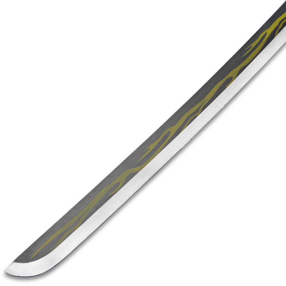 Zoomed view of the point of the carbon steel blade with yellow lightning bolt design. image number 3