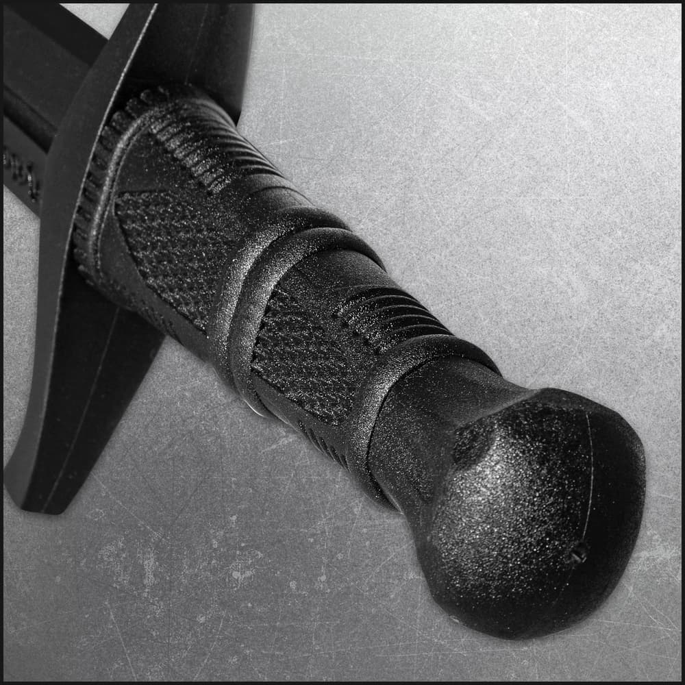 Close up image of the pommel and handle on the Training Dagger. image number 4