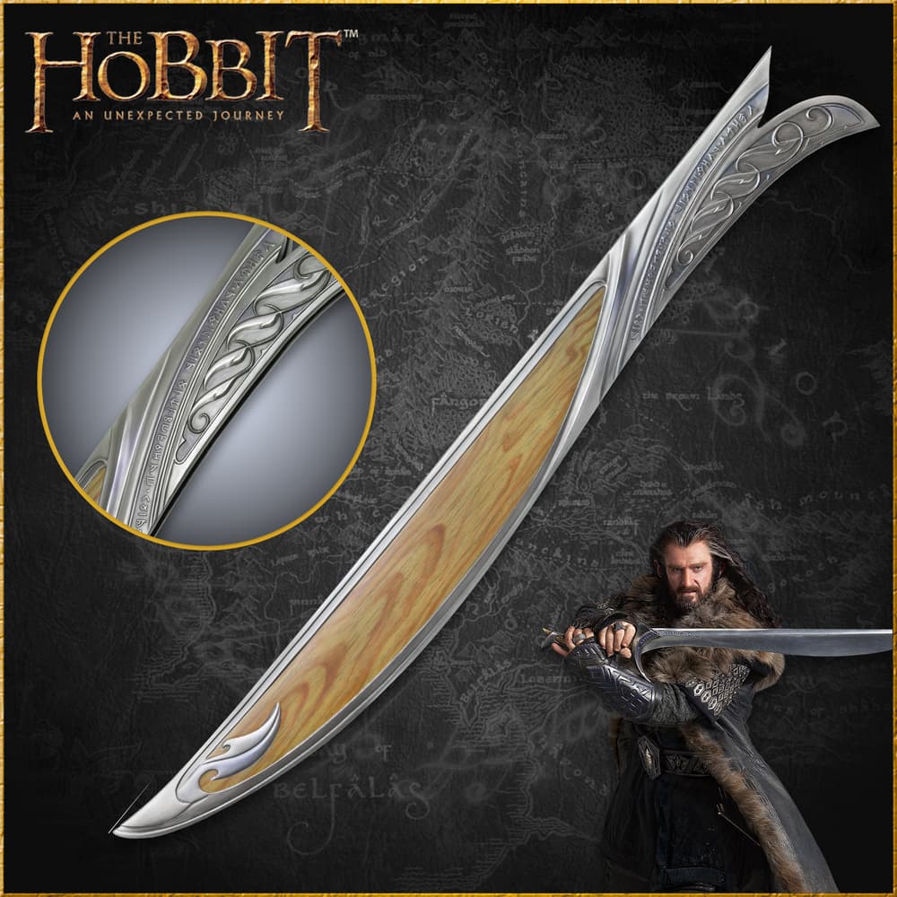Decorative sword with intricate design and character holding it image number 0