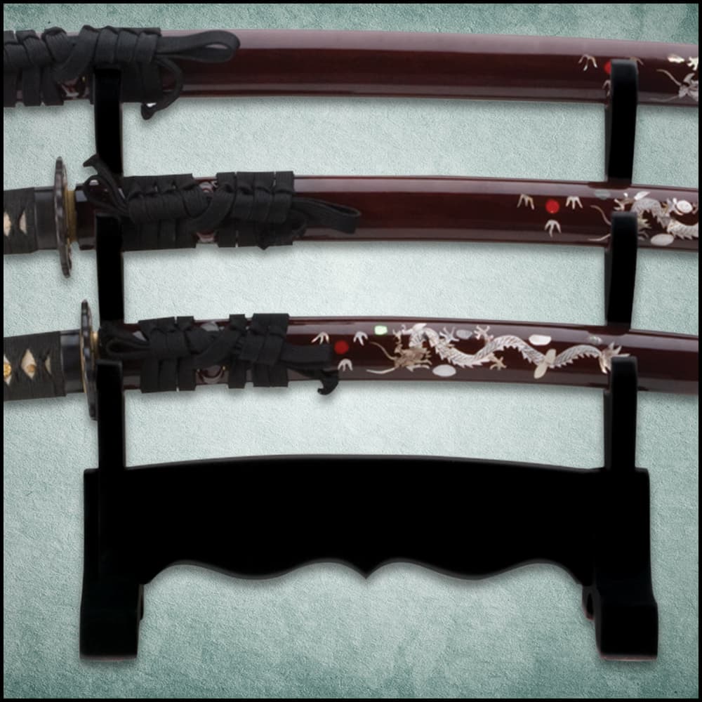 The three sword scabbards are maroon with natural pearl dragon design on the side. image number 2