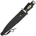 The 17 1/2” toothpick has a 11 7/8” 3Cr13 stainless steel blade with a brass spine plate and a hardwood handle