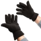 The black, 200g polar fleece gloves are adjustable at the wrist with a Velcro strap, assuring that one size fits most
