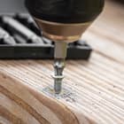 Plug the Screw Extractor into your drill to extract a stripped screw.