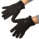 The gloves are constructed of 200g polar fleece, and the adjustable Velcro wrist strap assures that one size fits most