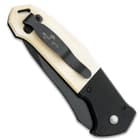 The handles are smooth white bone with black G10 bolsters with great fit and finish