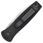 The 4 1/10”, handle is made of anodized aluminum, featuring a lanyard hole and a reversible, tip-up/down pocket clip