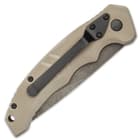 This automatic is 7 4/5” in overall length and features a lanyard hole and a tip-down pocket clip for ease of carry