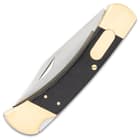 Closed pocket knife with silver blade and dark wood handle with gold accents on a white background.