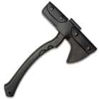 Black tomahawk axe with its head enclosed with a black leather sheath and its black textured nylon handle exposed on a white background.
