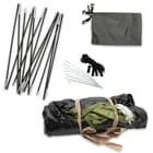 Included are guy ropes, pegs and a carrying bag
