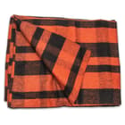 The 80 percent wool blanket measures 64" x 84" overall and weighs 4 lbs, adding insulation, especially, when you’re camping
