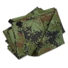 The tarp is made of Water-resistant 210T polyester with a camouflage pattern and is approximately 7 1/2’x 4 1/2’