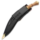 The 18” overall kukri knife comes with a regulation, genuine leather belt sheath with a brass tip