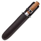 It comes with a genuine dark brown leather sheath with a buckle closure