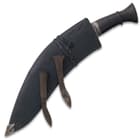It has a wooden handle and comes in a genuine leather sheath