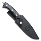 The knife is housed in a black leather sheath stamped with “Hibben Knives” logo.