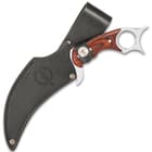 The 9 1/4” overall karambit knife can be stored and carried in its premium leather belt sheath with snap strap closure