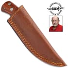 The 7 7/8” overall fixed blade slides securely into a premium leather sheath and the handle has a brass lanyard tube