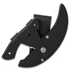 The sickle ulu stored in its leather sheath
