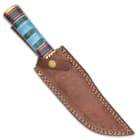 The 12” overall knife can be stored and carried in its genuine leather belt sheath, which features white top-stitching