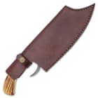 The 12” overall cleaver knife can be stored and carried in its premium leather belt sheath, which has a snap strap