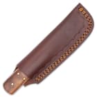 The 6 3/4” overall mini bushcraft knife can be carried unobtrusively at your side in its genuine leather belt sheath