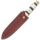 The 13 1/2” overall dagger can be carried and stored in its premium leather belt sheath, which has double-stitching