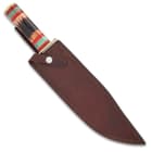 The fixed blade knife in its sheath