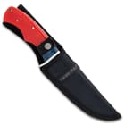 The fixed blade shown in sheath