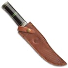 The knife is 14” in overall length and the blade is housed in a premium leather belt sheath with a snap closure