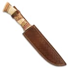 The 13 1/4” overall fixed blade knife slides securely into its premium, brown leather belt sheath for comfortable carry