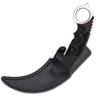 The karambit is housed in a genuine leather boot sheath with clip.